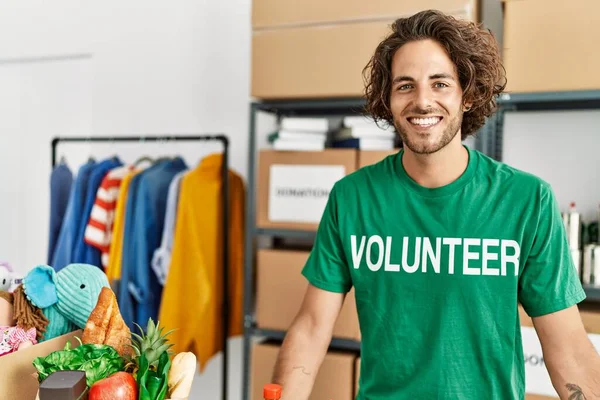 Young Hispanic Volunteer Smiling Happy Standing Charity Center — Stock Photo, Image