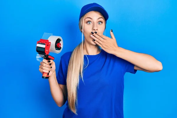 Young Beautiful Caucasian Woman Holding Packing Tape Covering Mouth Hand — Stock Photo, Image