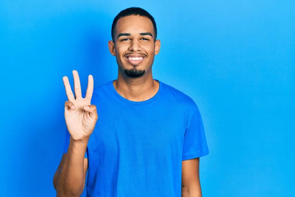 Jovem Afro Americano Vestindo Camisa Azul Casual Mostrando Apontando Para — Fotografia de Stock