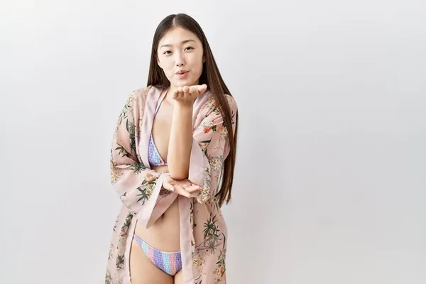 Young Asian Woman Wearing Bikini Floral Kimono Looking Camera Blowing — Stock Photo, Image