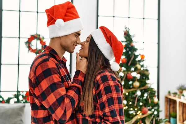 Young Latin Couple Smiling Happy Hugging Standing Christmas Tree Home — Stock Photo, Image