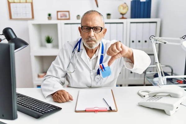 Mature Doctor Man Clinic Looking Unhappy Angry Showing Rejection Negative — Stock Photo, Image