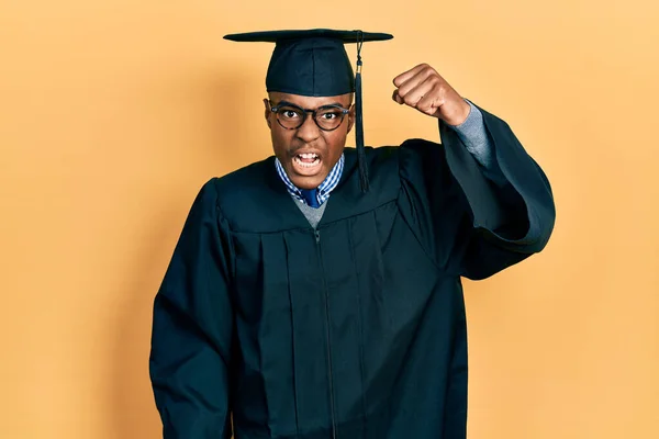 Young African American Man Wearing Graduation Cap Ceremony Robe Angry — Stock Photo, Image