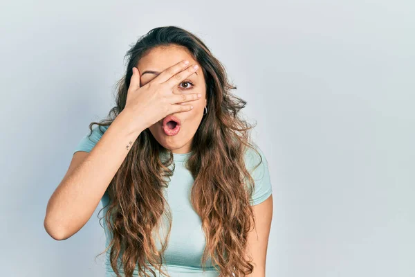 Young Hispanic Girl Wearing Casual Shirt Peeking Shock Covering Face — Stock Photo, Image