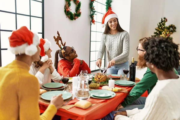 Group Young People Smiling Happy Having Christmas Dinner Woman Cutting — Stock Photo, Image