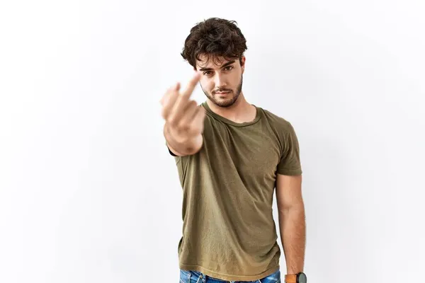 Hispanic Man Standing Isolated White Background Showing Middle Finger Impolite — Stock Photo, Image