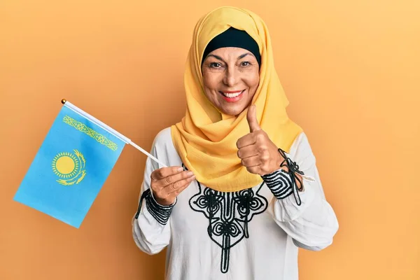 Middle Age Hispanic Woman Wearing Hijab Holding Kazakhstan Flag Smiling — Stock Photo, Image