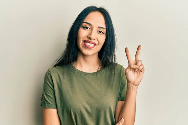 Young Hispanic Girl Wearing Casual Shirt Smiling Happy Face Winking — Stock Photo, Image