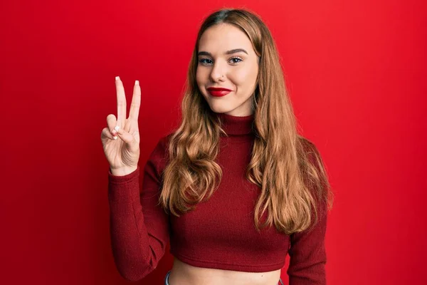 Young Blonde Woman Wearing Turtleneck Sweater Showing Pointing Fingers Number — Stock Photo, Image