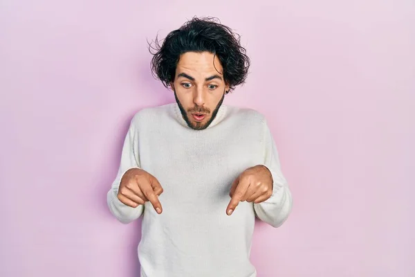 Handsome Hispanic Man Wearing Casual White Sweater Pointing Fingers Showing — Stock Photo, Image
