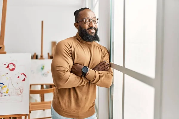 Young African American Artist Man Smiling Happy Standing Arms Crossed — Stockfoto