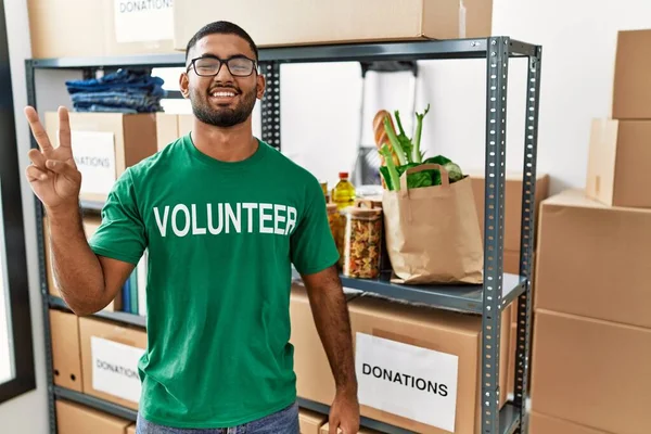Young Indian Man Volunteer Holding Donations Box Smiling Happy Face — Stock Photo, Image