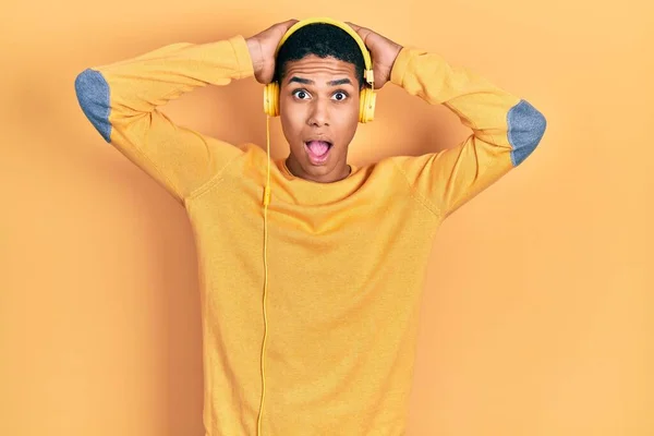 Young African American Guy Listening Music Using Headphones Crazy Scared — Stock Photo, Image