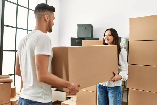 Young Hispanic Couple Smiling Happy Holding Cardboard Boxes Moving New — Stock Photo, Image
