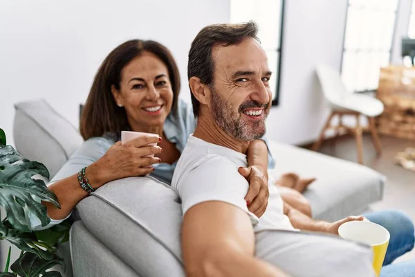 Middle Age Man Woman Couple Drinking Coffee Sitting Sofa Home — Stock Photo, Image