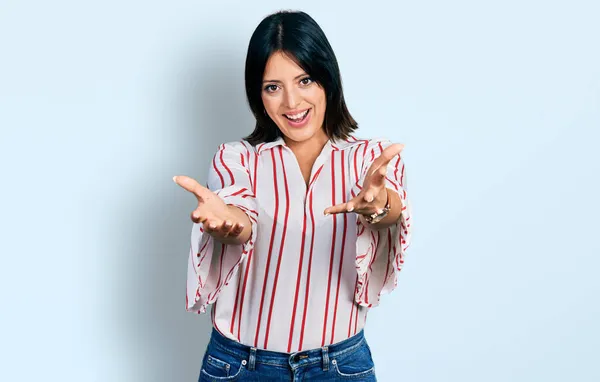 Young Hispanic Girl Wearing Casual Clothes Smiling Cheerful Offering Hands — Stock Photo, Image