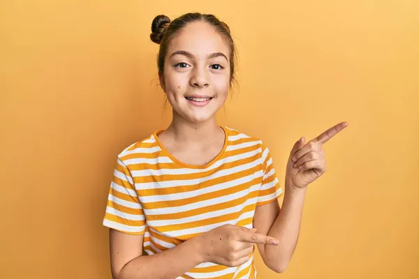 Beautiful Brunette Little Girl Wearing Casual Striped Shirt Smiling Looking — Stock Photo, Image