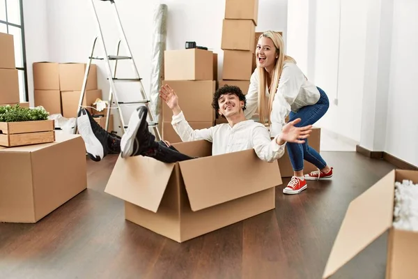 Young Beautiful Couple Smiling Happy Playing Using Cardboard Box Car — Stock Photo, Image
