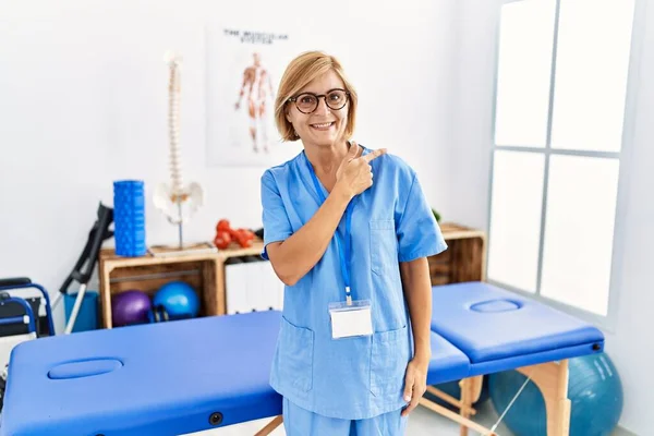 Middle Age Blonde Woman Working Pain Recovery Clinic Cheerful Smile — Stock Photo, Image