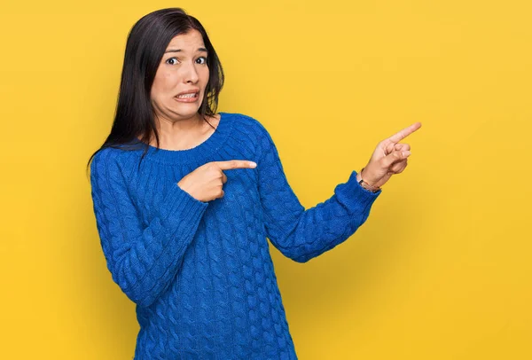 Young Hispanic Woman Wearing Casual Clothes Pointing Aside Worried Nervous — Stock Photo, Image