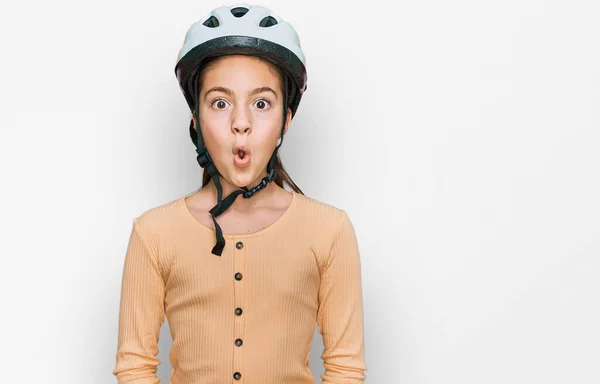 Beautiful Brunette Little Girl Wearing Bike Helmet Scared Amazed Open — Stock Photo, Image