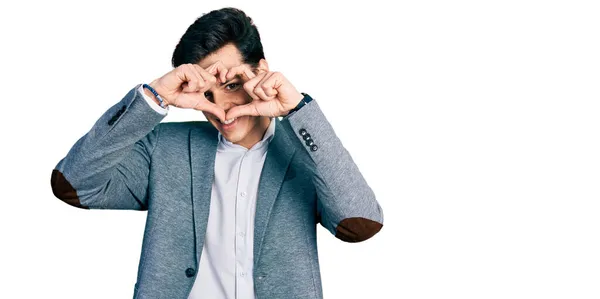 Young Hispanic Man Wearing Business Clothes Doing Heart Shape Hand — Stock Photo, Image