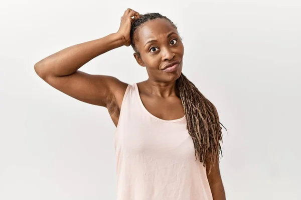 Black Woman Braids Standing Isolated Background Confuse Wonder Question Uncertain — Stock Photo, Image