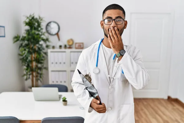 Young Indian Man Wearing Doctor Uniform Stethoscope Laughing Embarrassed Giggle — Stock Photo, Image