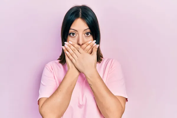 Young Hispanic Woman Wearing Casual Pink Shirt Shocked Covering Mouth — Stock Photo, Image