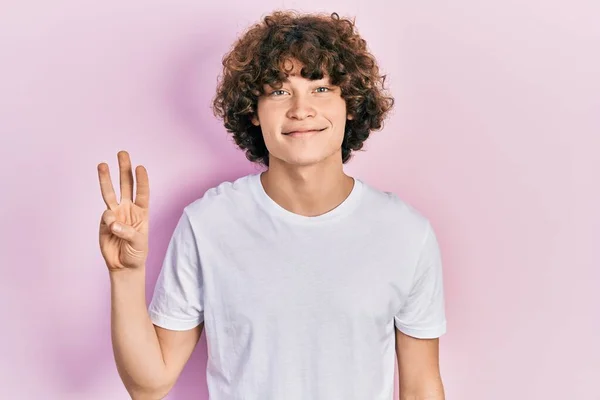Handsome Young Man Wearing Casual White Shirt Showing Pointing Fingers — Stock Photo, Image
