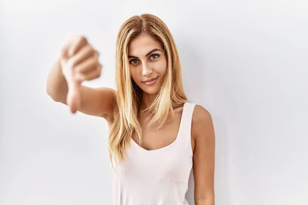 Blonde Beautiful Young Woman Standing White Isolated Background Looking Unhappy — Stok fotoğraf