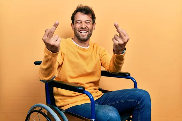 Handsome Man Beard Sitting Wheelchair Showing Middle Finger Doing Fuck — Fotografia de Stock