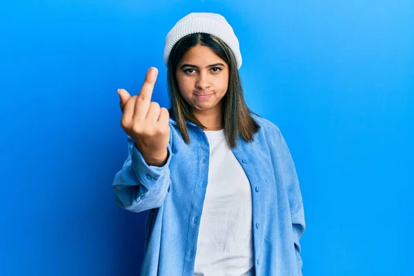 Young Latin Woman Wearing Cute Wool Cap Showing Middle Finger — Stok fotoğraf
