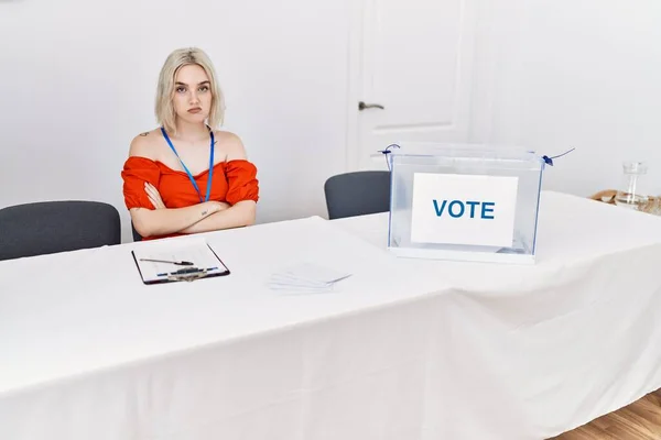 Young Caucasian Woman Political Election Sitting Ballot Skeptic Nervous Disapproving — Zdjęcie stockowe