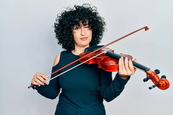 Young Middle East Woman Playing Violin Skeptic Nervous Frowning Upset — Stock Photo, Image