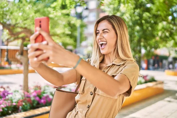 Young Blonde Girl Smiling Happy Making Selfie Smartphone City — Zdjęcie stockowe