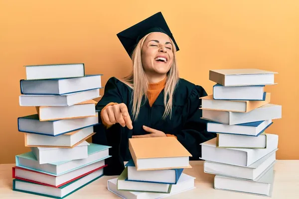 Young Caucasian Woman Wearing Graduation Ceremony Robe Sitting Table Laughing — Stock Photo, Image