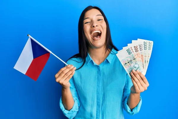Young Latin Woman Holding Czech Republic Flag Koruna Banknotes Celebrating — Stock fotografie