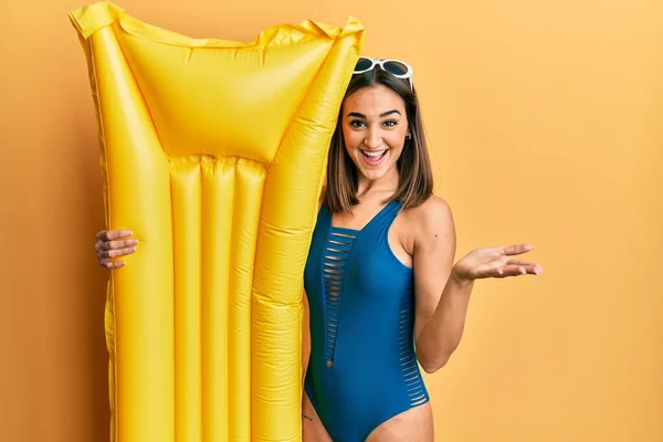 Young Brunette Girl Wearing Swimsuit Holding Summer Float Celebrating Achievement — Stockfoto