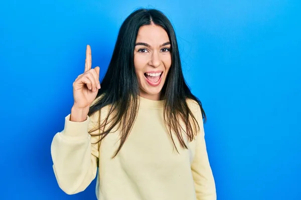 Young Brunette Woman Wearing Casual Sweatshirt Pointing Finger Successful Idea — Foto Stock