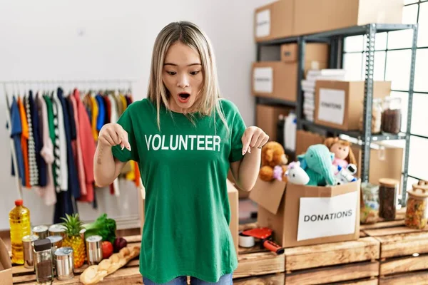 Asian Young Woman Wearing Volunteer Shirt Donations Stand Pointing Fingers — Stock Photo, Image