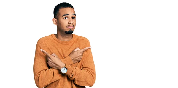 Young African American Man Wearing Casual Clothes Pointing Both Sides — Stock Photo, Image