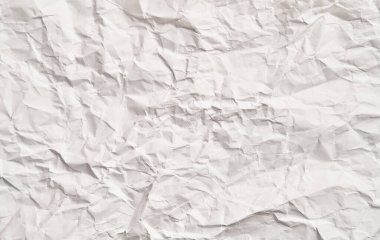 Kırışıklıkları olan beyaz buruşuk kağıt dokusu. Hasarlı ve yırtık çarşaf