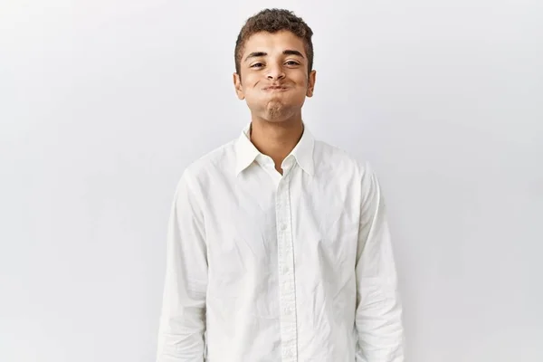 Young Handsome Hispanic Man Standing Isolated Background Puffing Cheeks Funny — ストック写真