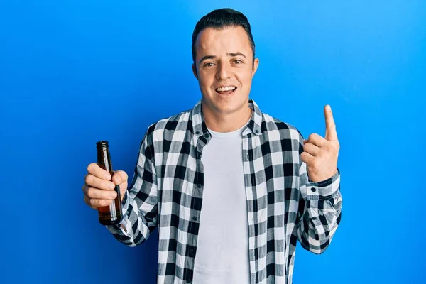 Handsome Young Man Drinking Pint Beer Smiling Idea Question Pointing — ストック写真