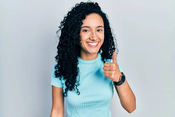 Young Hispanic Woman Curly Hair Wearing Casual Blue Shirt Doing — Foto Stock