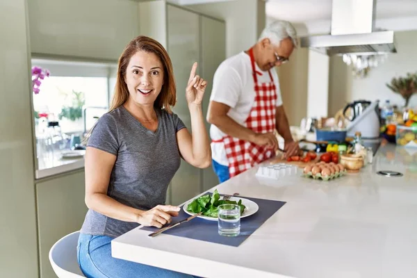 Middle Age Hispanic Couple Eating Healthy Salad Home Surprised Idea — 图库照片