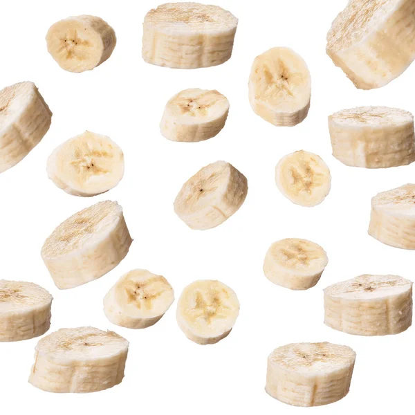 Шматочки Банана Літають Ізольовані Білому Тлі — стокове фото