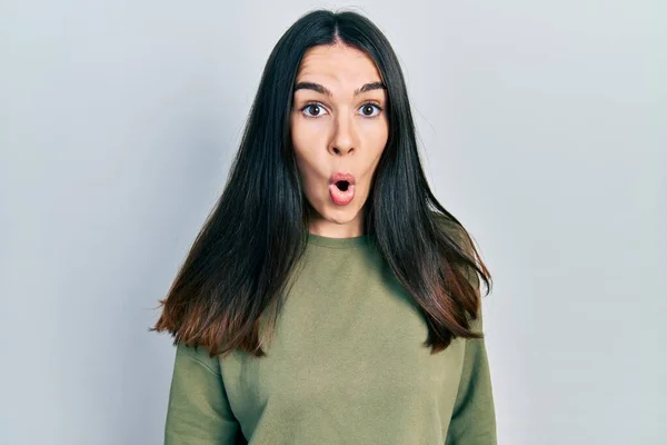 Young Brunette Woman Wearing Casual Green Sweater Scared Amazed Open — Foto Stock
