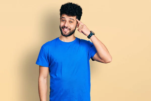 Young Arab Man Beard Wearing Casual Blue Shirt Smiling Pointing — Stockfoto
